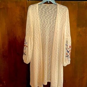 Beautiful long cardigan- Beige with flowers on sleeves.